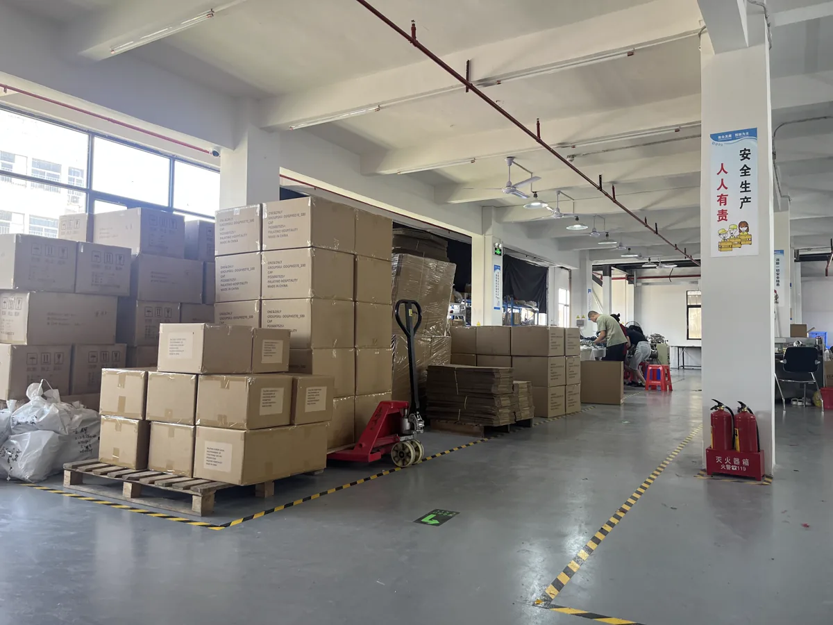 Finished goods and shipping cartons in the SXMX hat factory warehouse