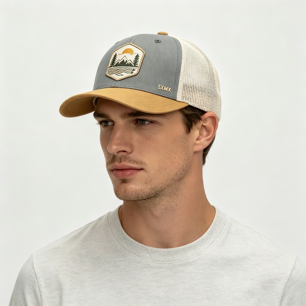 Custom Mountain Patch Trucker Cap with Black Mesh Back on model