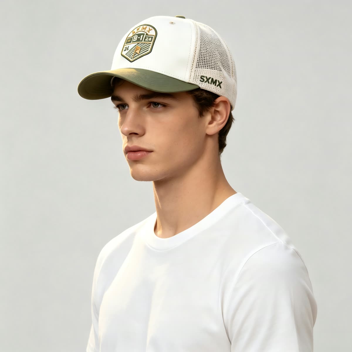 Custom Olive Embroidered Crest Trucker Cap with Mesh Back on model