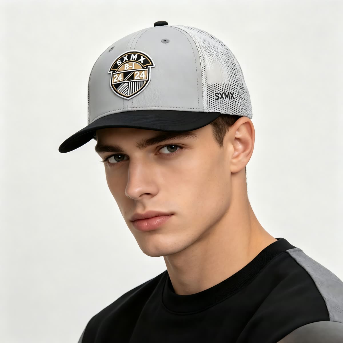 Custom Black Shield Patch Trucker Cap with Mesh Back on model