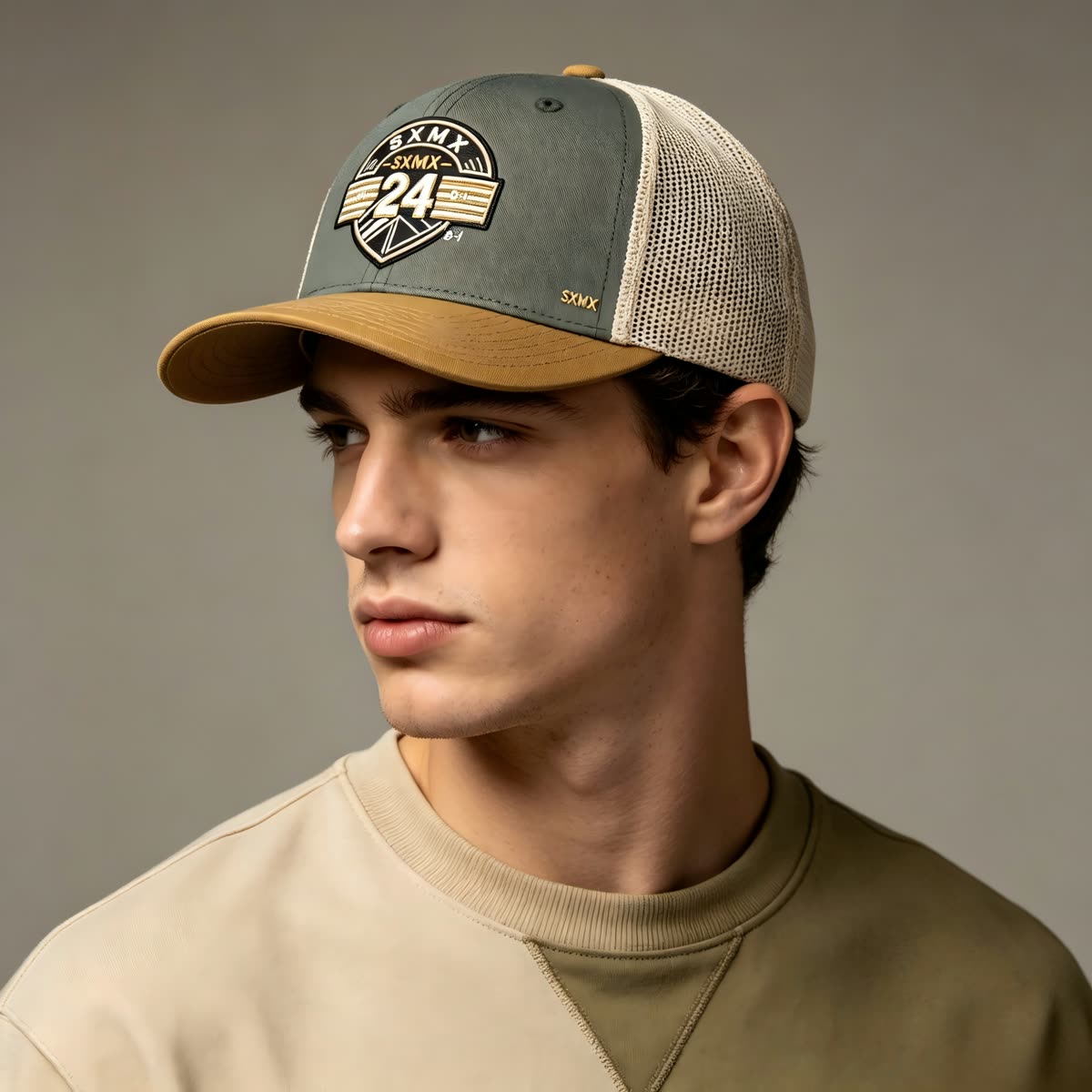 Custom Black Shield Patch Trucker Cap with Mesh Back on model