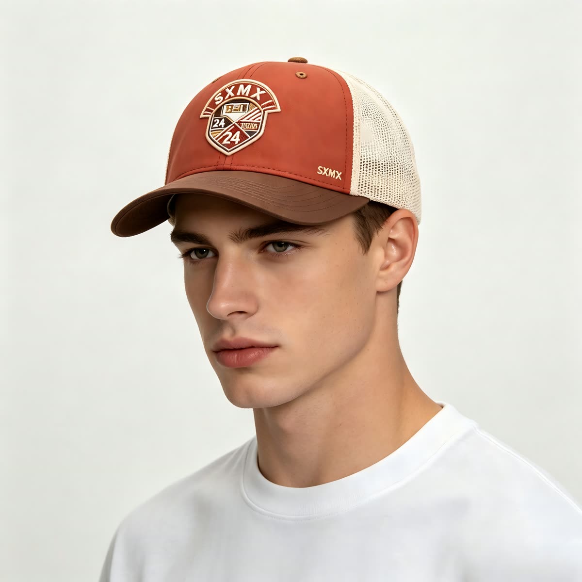 Custom Navy Striped Badge Trucker Cap with Red Brim on model