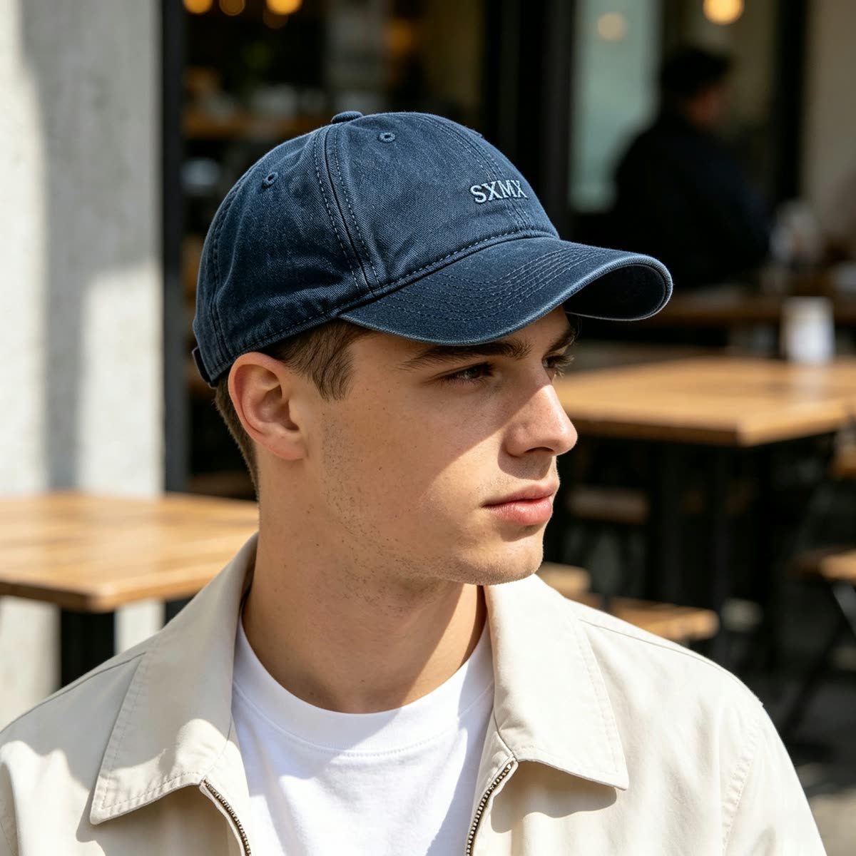 Custom Navy Washed Cotton Dad Cap with Tonal Embroidery on model