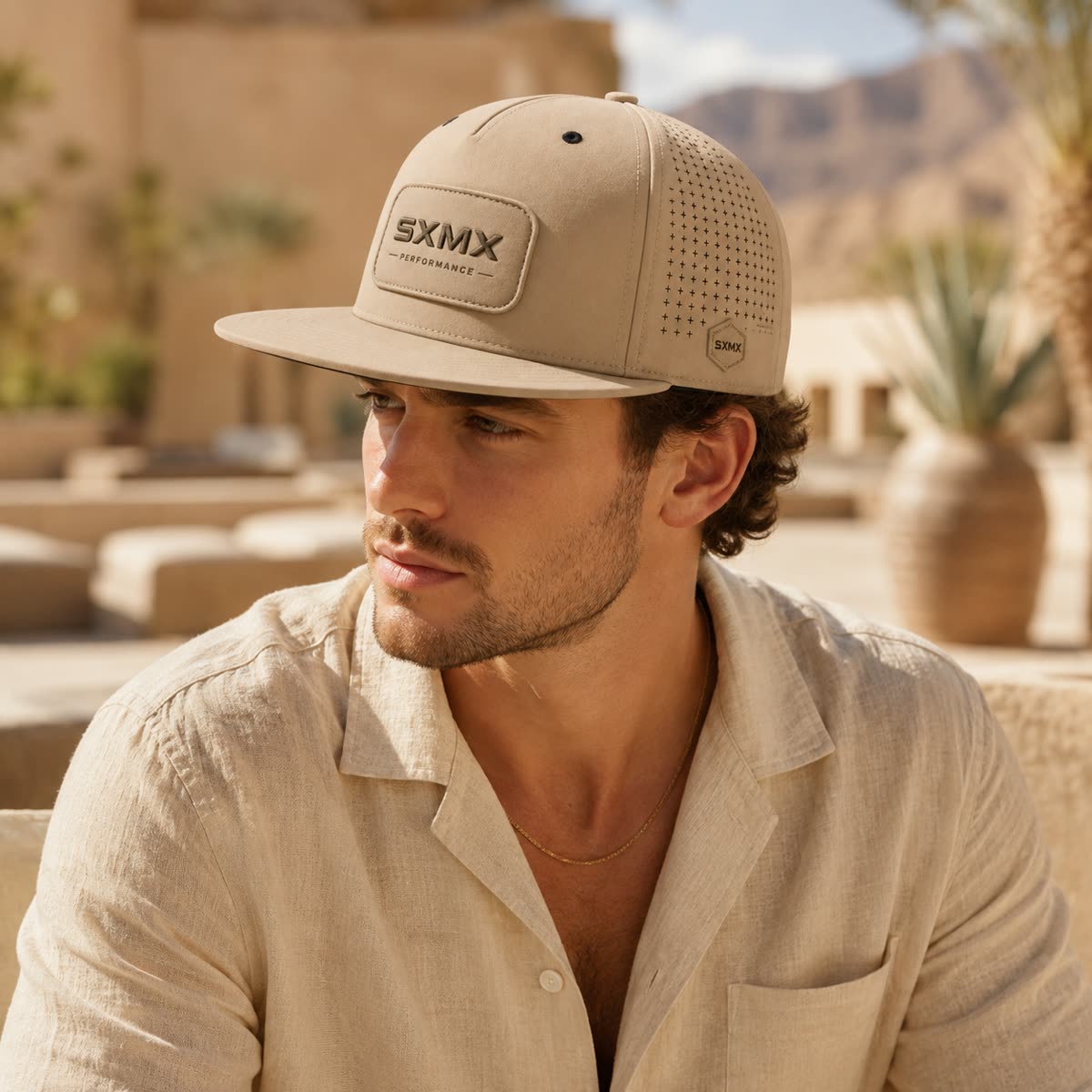 Custom Perforated Flat Brim Cap with Hexagon Badge on model