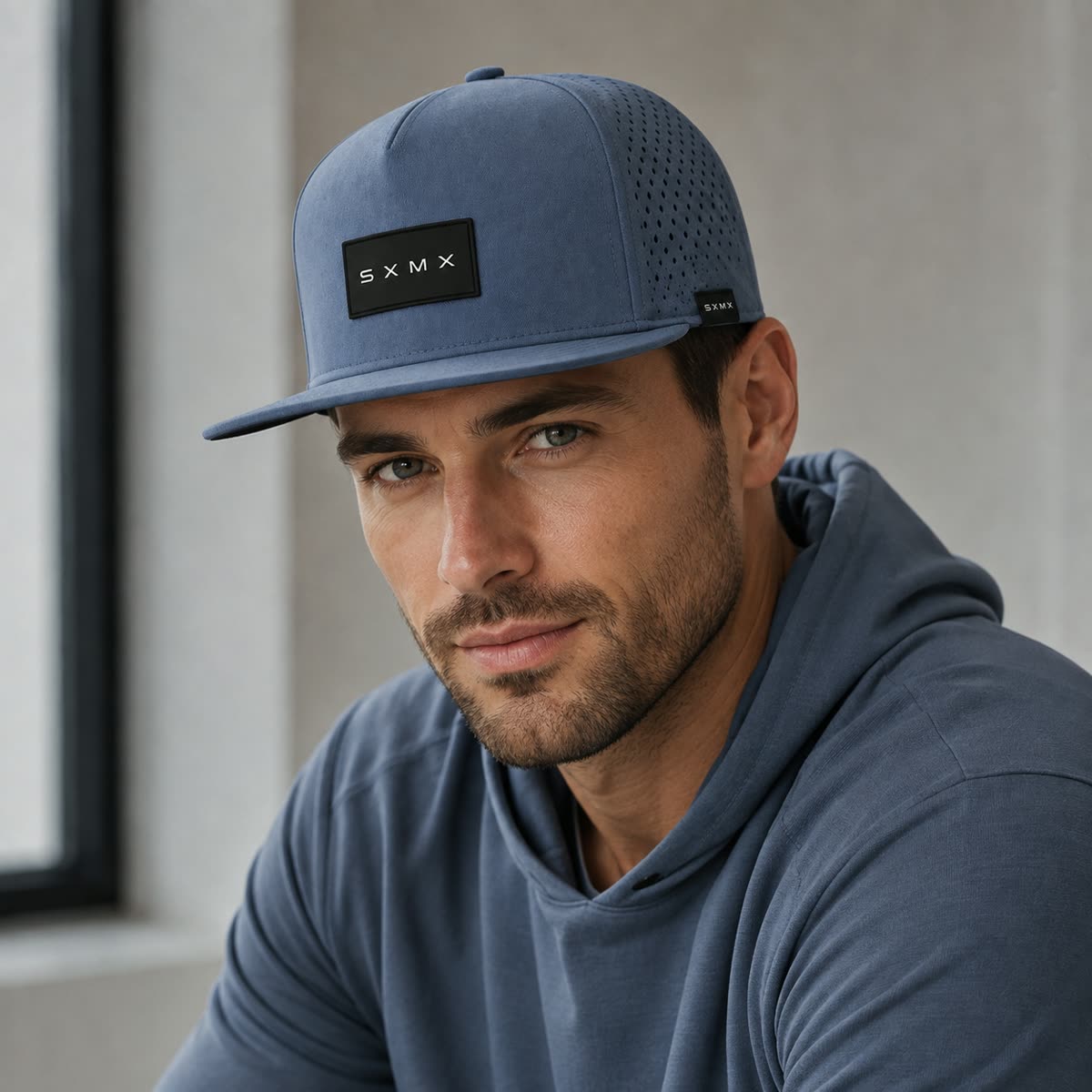Custom Black Topographic Trucker Cap with Rubber Patch on model