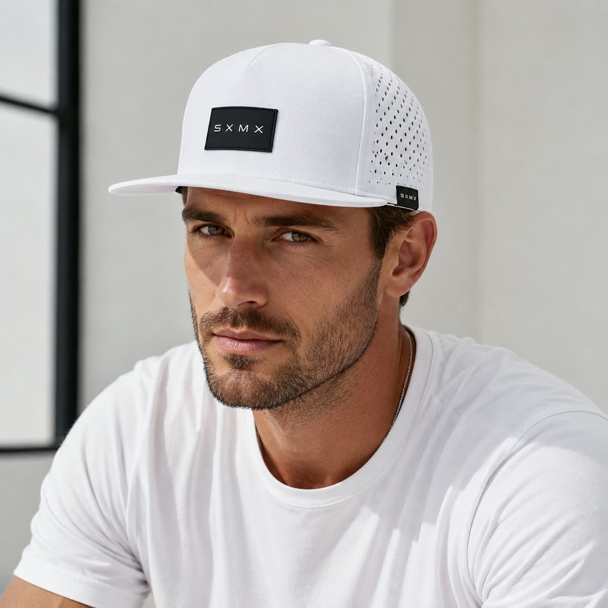 Custom Black Topographic Trucker Cap with Rubber Patch on model