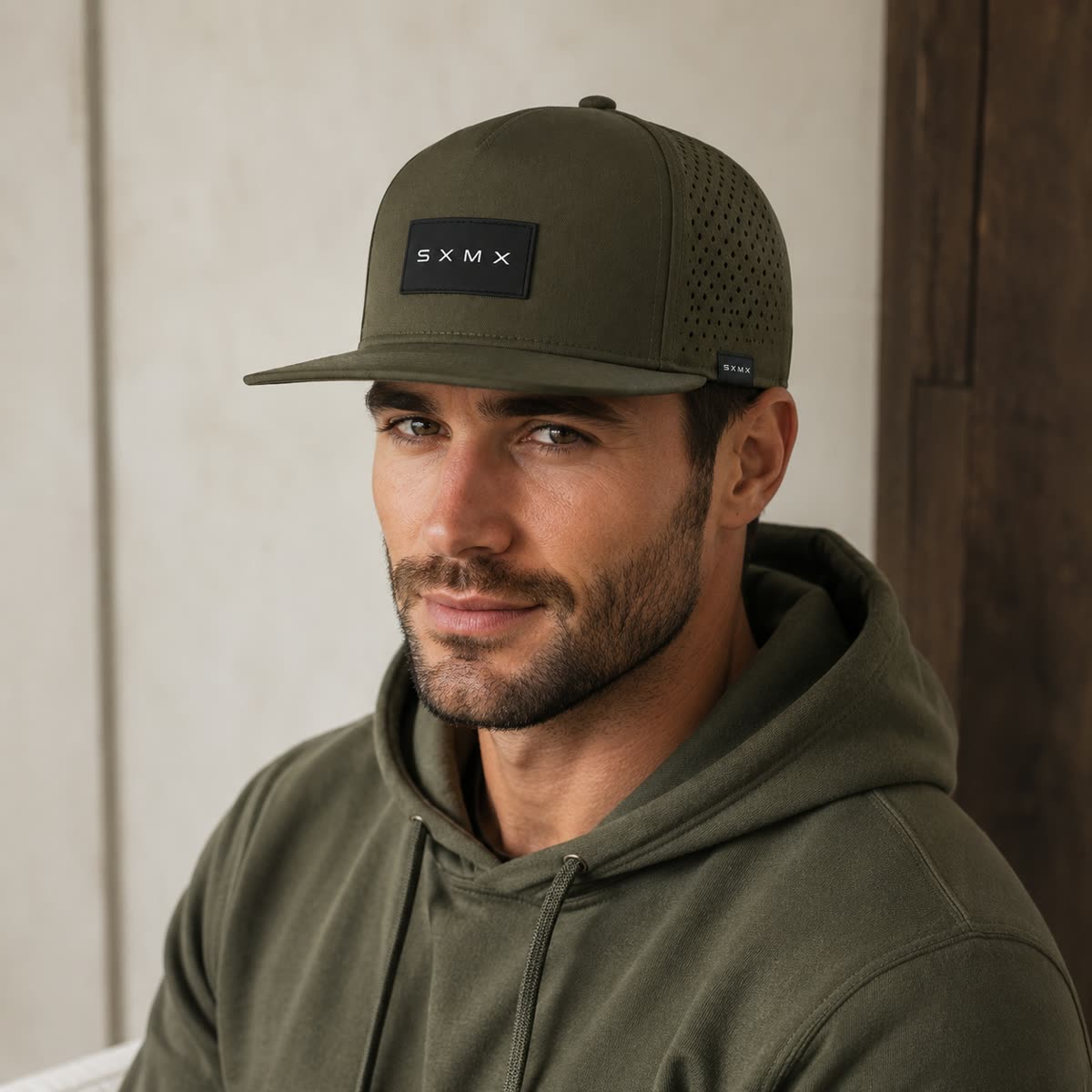 Custom Black Topographic Trucker Cap with Rubber Patch on model